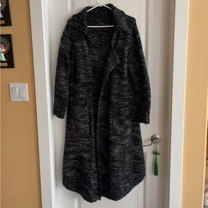 Long very nice sweater without buttons.